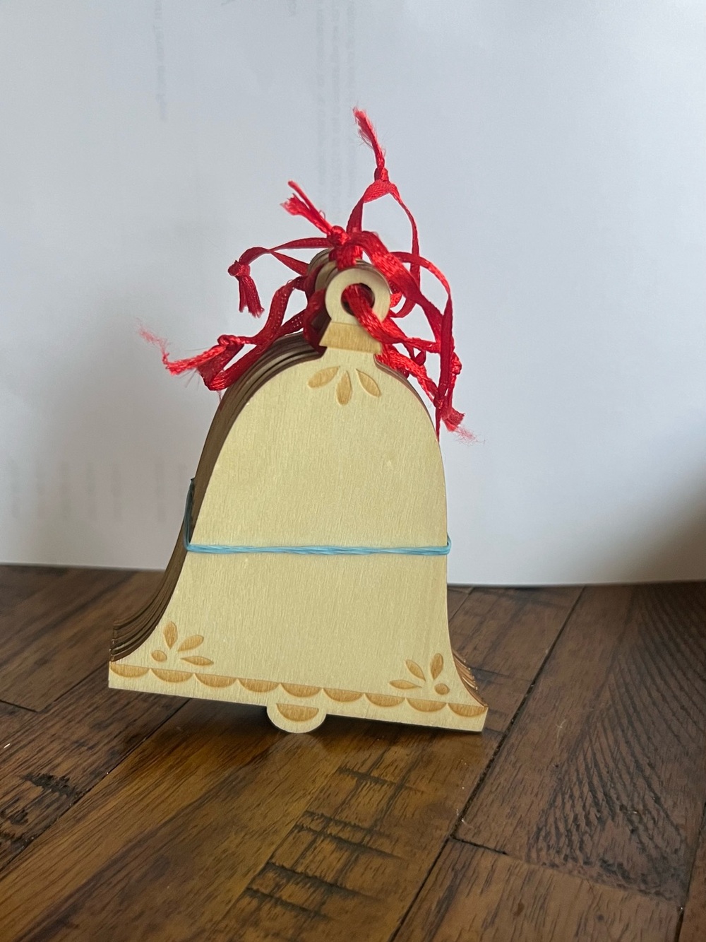 Makers Market Natural Wood Bell Ornament with Red Ribbon and Light Blue Accent